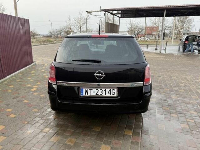 Черный Опель Астра, объемом двигателя 1.7 л и пробегом 240 тыс. км за 2800 $, фото 5 на Automoto.ua