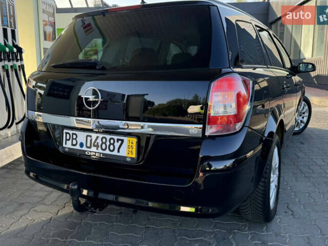 Черный Опель Астра, объемом двигателя 1.6 л и пробегом 197 тыс. км за 5700 $, фото 11 на Automoto.ua