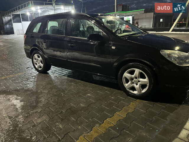 Черный Опель Астра, объемом двигателя 1.69 л и пробегом 270 тыс. км за 5500 $, фото 21 на Automoto.ua