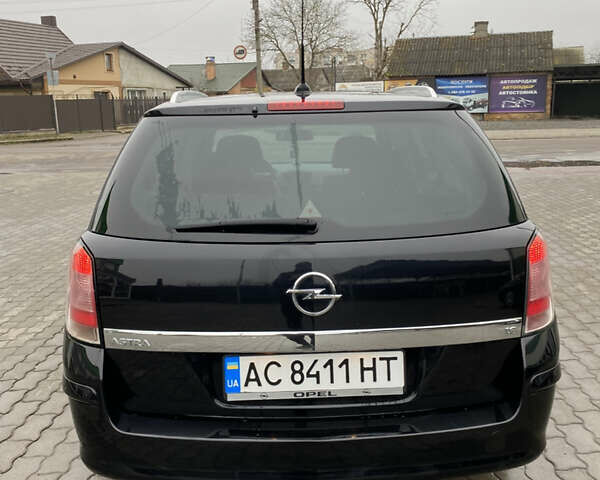 Черный Опель Астра, объемом двигателя 1.6 л и пробегом 230 тыс. км за 5000 $, фото 9 на Automoto.ua