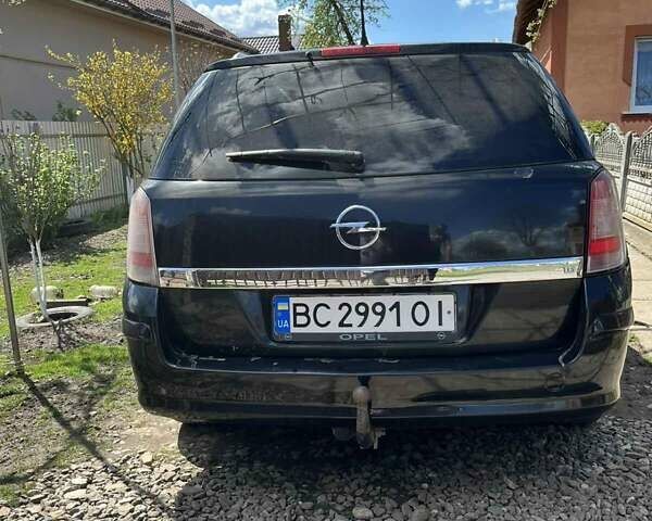 Черный Опель Астра, объемом двигателя 1.6 л и пробегом 218 тыс. км за 5000 $, фото 4 на Automoto.ua