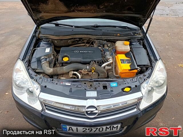 Черный Опель Астра, объемом двигателя 1.7 л и пробегом 300 тыс. км за 5250 $, фото 10 на Automoto.ua
