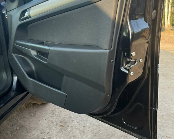 Черный Опель Астра, объемом двигателя 1.69 л и пробегом 270 тыс. км за 5500 $, фото 13 на Automoto.ua