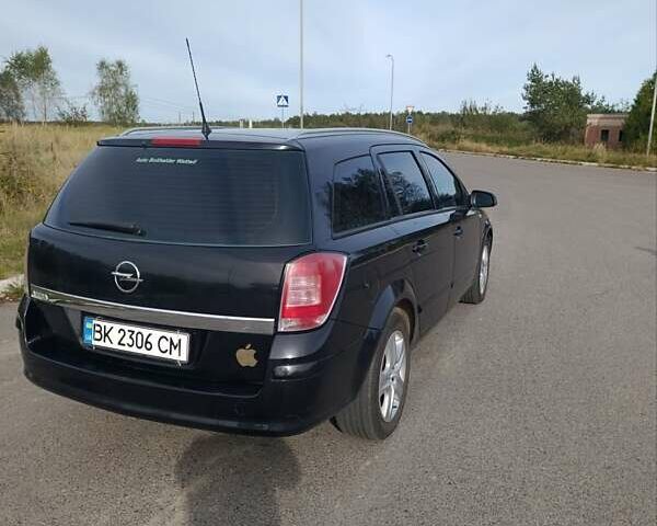 Черный Опель Астра, объемом двигателя 1.6 л и пробегом 250 тыс. км за 5200 $, фото 25 на Automoto.ua