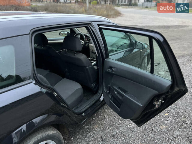 Черный Опель Астра, объемом двигателя 1.8 л и пробегом 209 тыс. км за 5600 $, фото 24 на Automoto.ua