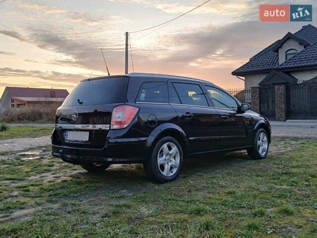 Черный Опель Астра, объемом двигателя 1.8 л и пробегом 177 тыс. км за 5199 $, фото 4 на Automoto.ua