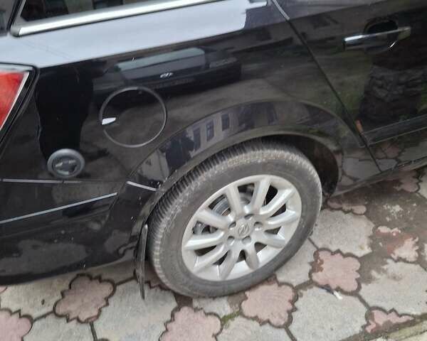 Чорний Опель Астра, об'ємом двигуна 1.6 л та пробігом 210 тис. км за 5950 $, фото 4 на Automoto.ua