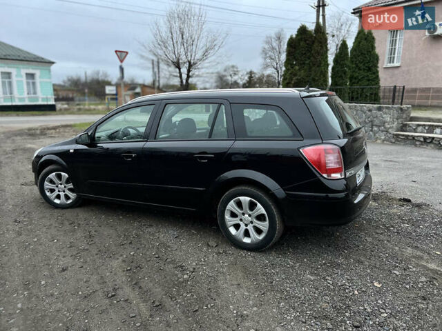 Черный Опель Астра, объемом двигателя 1.8 л и пробегом 209 тыс. км за 5600 $, фото 10 на Automoto.ua