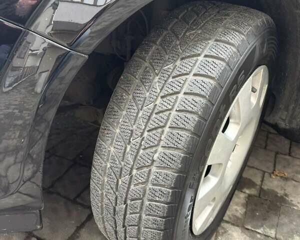 Черный Опель Астра, объемом двигателя 1.7 л и пробегом 276 тыс. км за 5200 $, фото 8 на Automoto.ua