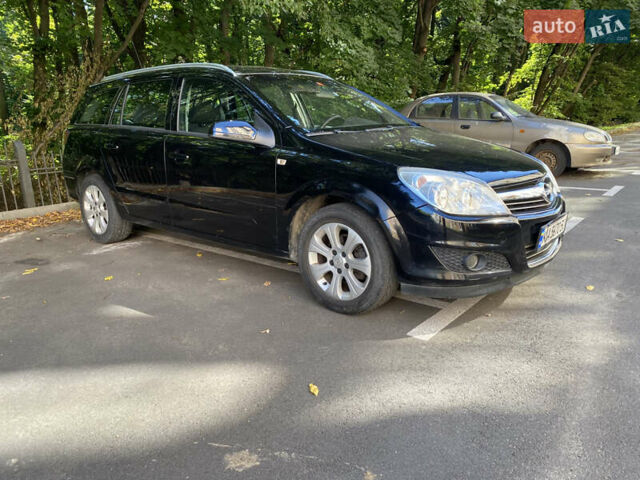 Черный Опель Астра, объемом двигателя 1.8 л и пробегом 145 тыс. км за 5900 $, фото 2 на Automoto.ua