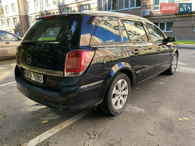 Черный Опель Астра, объемом двигателя 1.8 л и пробегом 145 тыс. км за 5900 $, фото 3 на Automoto.ua