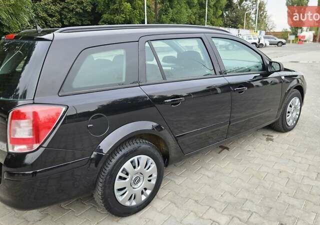 Черный Опель Астра, объемом двигателя 1.6 л и пробегом 209 тыс. км за 5850 $, фото 29 на Automoto.ua