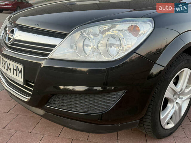 Черный Опель Астра, объемом двигателя 1.69 л и пробегом 260 тыс. км за 5550 $, фото 17 на Automoto.ua