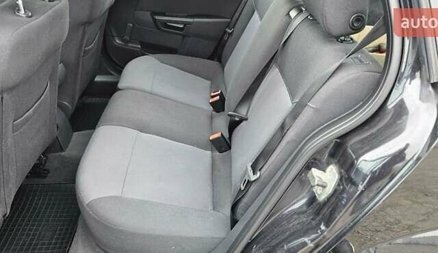 Черный Опель Астра, объемом двигателя 1.6 л и пробегом 210 тыс. км за 5850 $, фото 31 на Automoto.ua