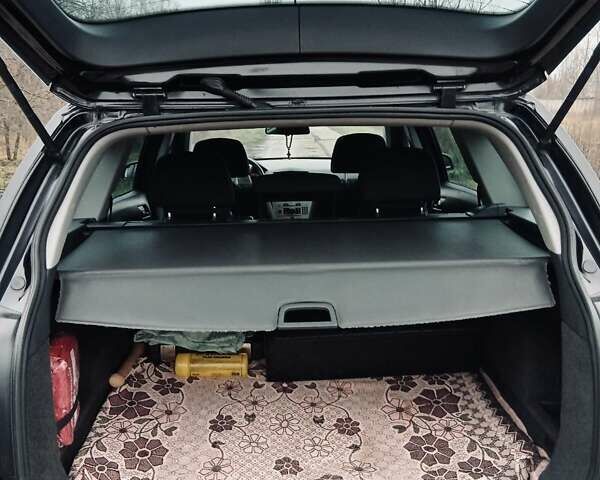 Черный Опель Астра, объемом двигателя 1.9 л и пробегом 262 тыс. км за 5500 $, фото 7 на Automoto.ua