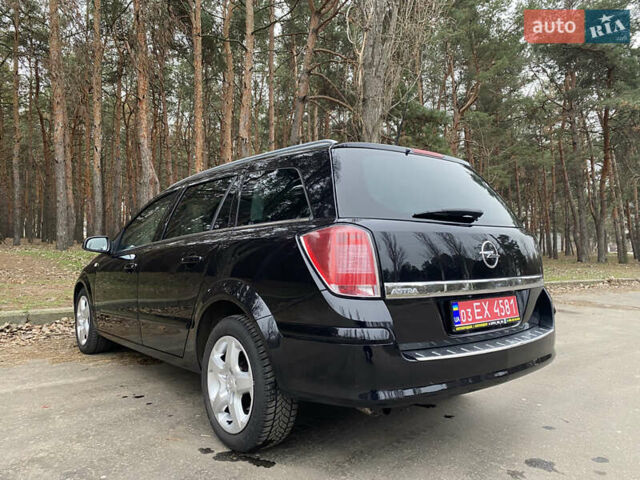 Черный Опель Астра, объемом двигателя 1.6 л и пробегом 194 тыс. км за 5800 $, фото 19 на Automoto.ua
