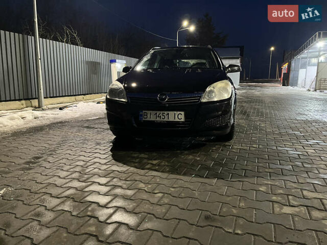 Черный Опель Астра, объемом двигателя 1.69 л и пробегом 270 тыс. км за 5500 $, фото 19 на Automoto.ua