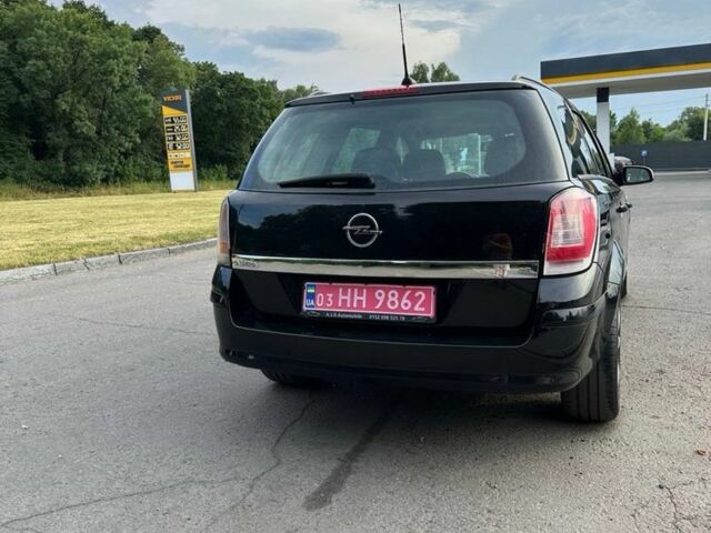Черный Опель Астра, объемом двигателя 1.6 л и пробегом 152 тыс. км за 4800 $, фото 12 на Automoto.ua