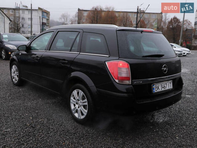 Черный Опель Астра, объемом двигателя 1.69 л и пробегом 308 тыс. км за 5500 $, фото 5 на Automoto.ua