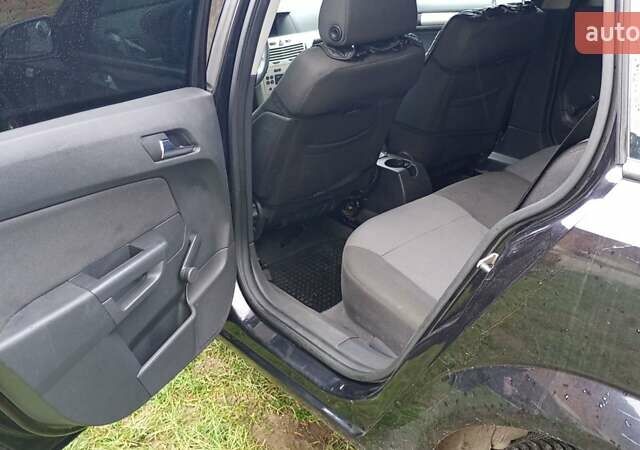 Черный Опель Астра, объемом двигателя 1.6 л и пробегом 163 тыс. км за 5500 $, фото 2 на Automoto.ua