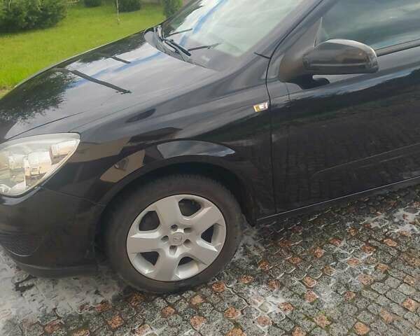 Черный Опель Астра, объемом двигателя 1.6 л и пробегом 200 тыс. км за 6000 $, фото 15 на Automoto.ua