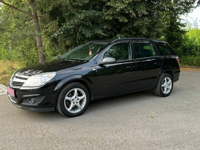 Черный Опель Астра, объемом двигателя 1.6 л и пробегом 152 тыс. км за 4800 $, фото 4 на Automoto.ua