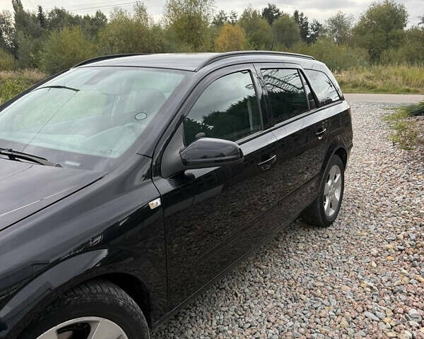 Черный Опель Астра, объемом двигателя 1.9 л и пробегом 254 тыс. км за 5100 $, фото 4 на Automoto.ua