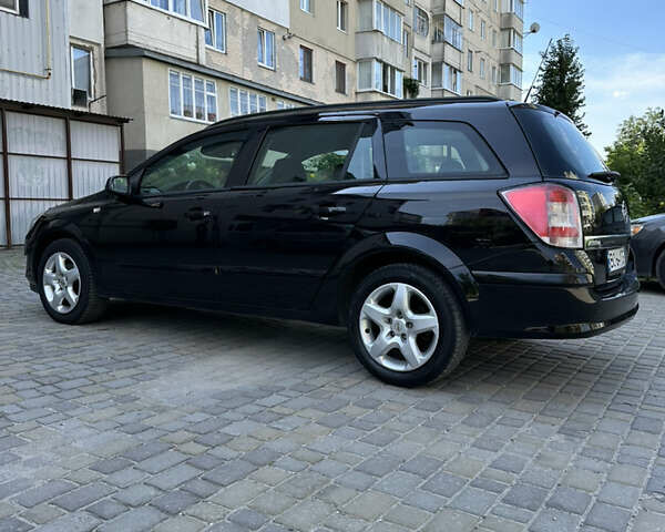 Черный Опель Астра, объемом двигателя 1.6 л и пробегом 188 тыс. км за 5650 $, фото 6 на Automoto.ua