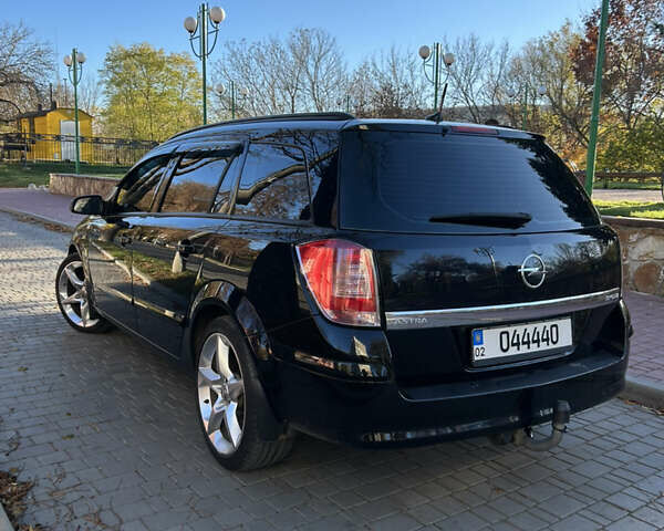 Черный Опель Астра, объемом двигателя 1.9 л и пробегом 191 тыс. км за 7000 $, фото 2 на Automoto.ua