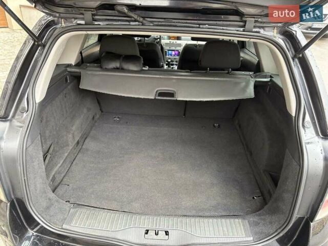 Черный Опель Астра, объемом двигателя 1.7 л и пробегом 276 тыс. км за 5200 $, фото 3 на Automoto.ua