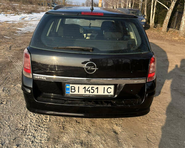 Черный Опель Астра, объемом двигателя 1.69 л и пробегом 270 тыс. км за 5500 $, фото 4 на Automoto.ua