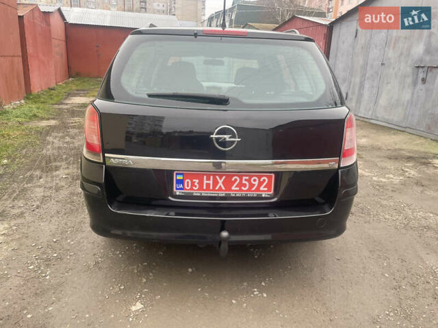Черный Опель Астра, объемом двигателя 1.6 л и пробегом 206 тыс. км за 4900 $, фото 2 на Automoto.ua
