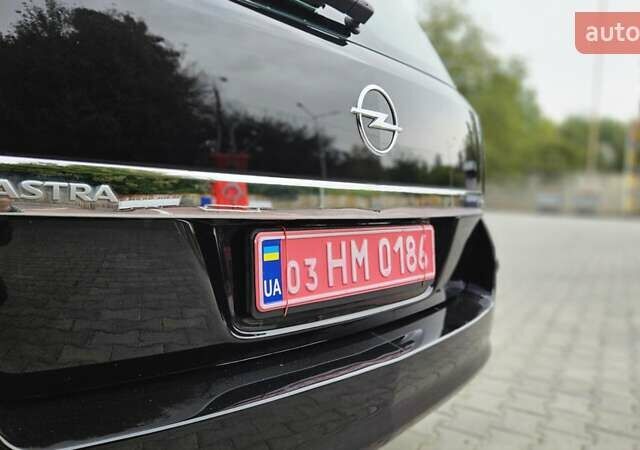 Черный Опель Астра, объемом двигателя 1.6 л и пробегом 209 тыс. км за 5850 $, фото 23 на Automoto.ua