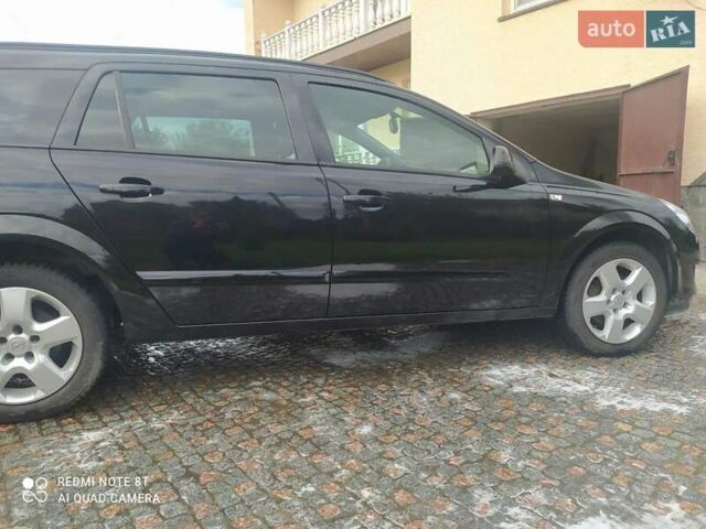 Черный Опель Астра, объемом двигателя 1.6 л и пробегом 200 тыс. км за 6000 $, фото 1 на Automoto.ua