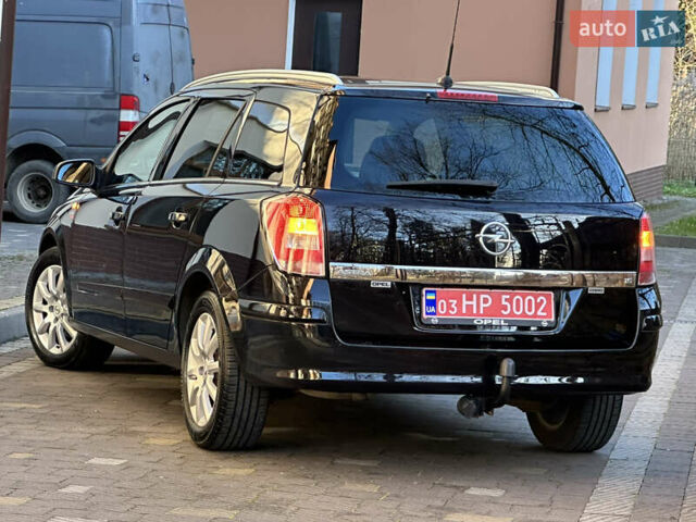 Черный Опель Астра, объемом двигателя 1.6 л и пробегом 180 тыс. км за 5499 $, фото 39 на Automoto.ua