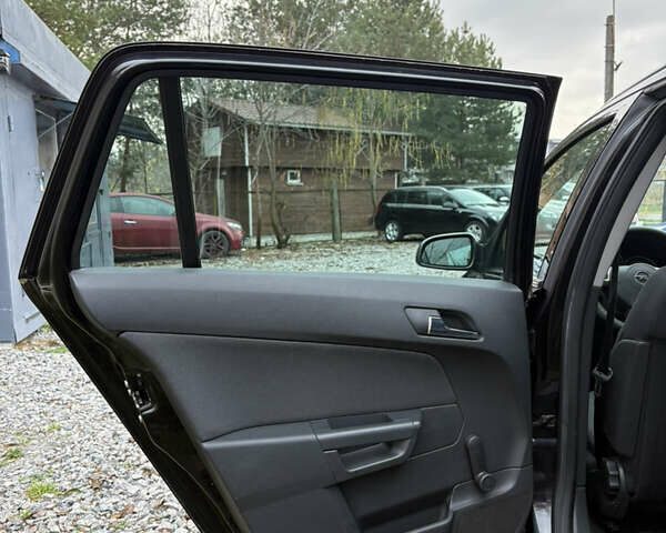 Черный Опель Астра, объемом двигателя 1.6 л и пробегом 208 тыс. км за 5600 $, фото 22 на Automoto.ua