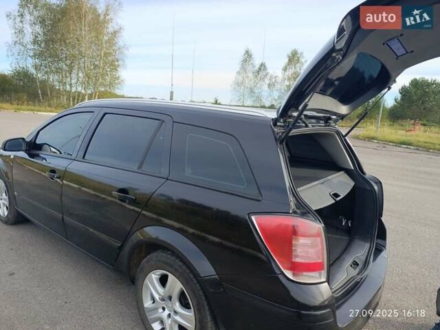 Черный Опель Астра, объемом двигателя 1.6 л и пробегом 250 тыс. км за 5200 $, фото 7 на Automoto.ua
