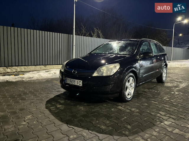 Черный Опель Астра, объемом двигателя 1.69 л и пробегом 270 тыс. км за 5500 $, фото 18 на Automoto.ua