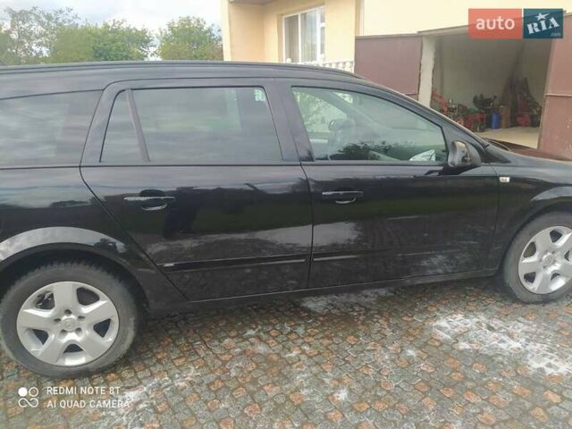 Черный Опель Астра, объемом двигателя 1.6 л и пробегом 200 тыс. км за 6000 $, фото 3 на Automoto.ua