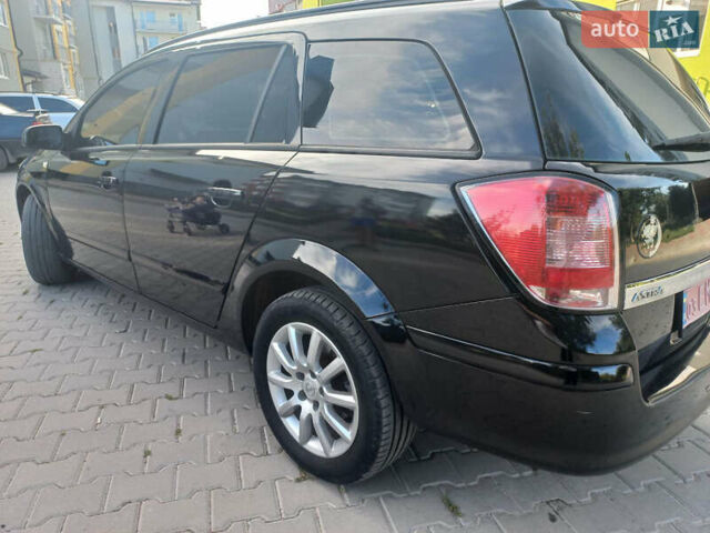 Черный Опель Астра, объемом двигателя 1.6 л и пробегом 260 тыс. км за 6000 $, фото 12 на Automoto.ua