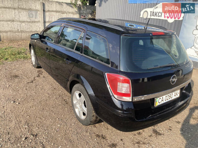 Черный Опель Астра, объемом двигателя 1.6 л и пробегом 243 тыс. км за 5500 $, фото 2 на Automoto.ua