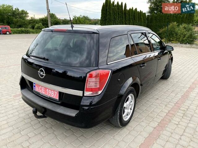 Черный Опель Астра, объемом двигателя 1.6 л и пробегом 222 тыс. км за 5200 $, фото 12 на Automoto.ua