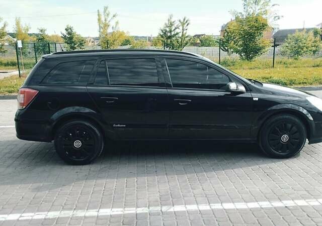 Черный Опель Астра, объемом двигателя 1.6 л и пробегом 260 тыс. км за 5400 $, фото 2 на Automoto.ua