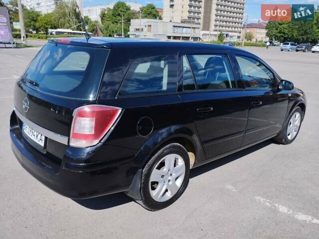 Черный Опель Астра, объемом двигателя 1.6 л и пробегом 240 тыс. км за 5250 $, фото 34 на Automoto.ua