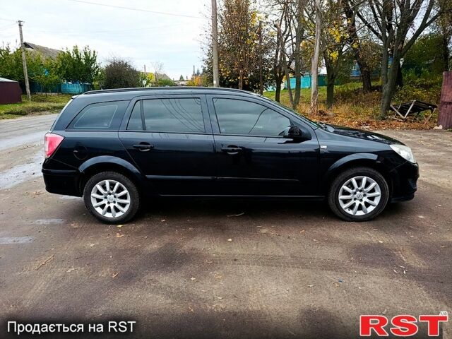 Черный Опель Астра, объемом двигателя 1.7 л и пробегом 300 тыс. км за 5250 $, фото 6 на Automoto.ua