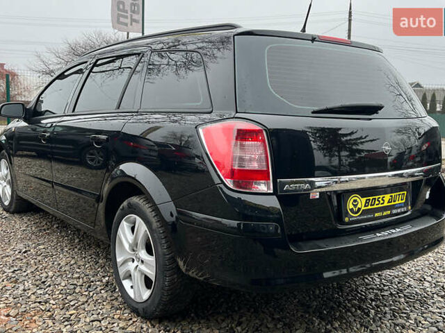 Черный Опель Астра, объемом двигателя 1.6 л и пробегом 260 тыс. км за 6200 $, фото 4 на Automoto.ua