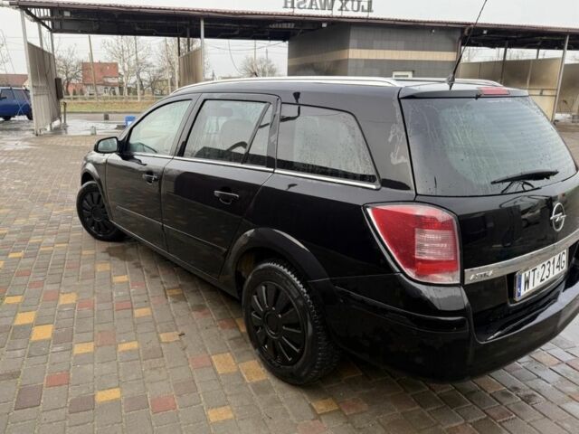 Черный Опель Астра, объемом двигателя 1.7 л и пробегом 240 тыс. км за 2800 $, фото 4 на Automoto.ua