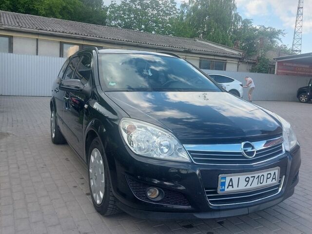 Черный Опель Астра, объемом двигателя 1.6 л и пробегом 270 тыс. км за 5600 $, фото 1 на Automoto.ua