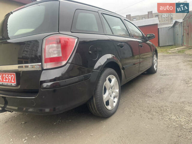 Черный Опель Астра, объемом двигателя 1.6 л и пробегом 206 тыс. км за 4900 $, фото 3 на Automoto.ua