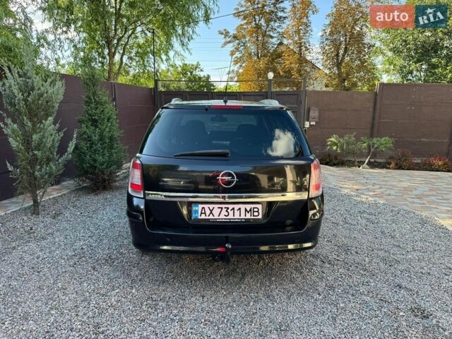 Черный Опель Астра, объемом двигателя 1.8 л и пробегом 248 тыс. км за 5500 $, фото 4 на Automoto.ua
